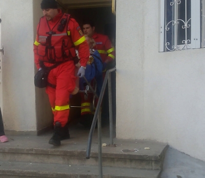 Femeie rănită după ce i-a explodat apartamentul