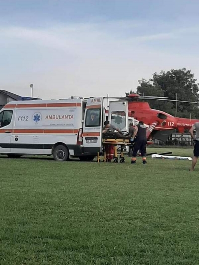 Muncitor strivit de cupa excavatorului pe care îl repara