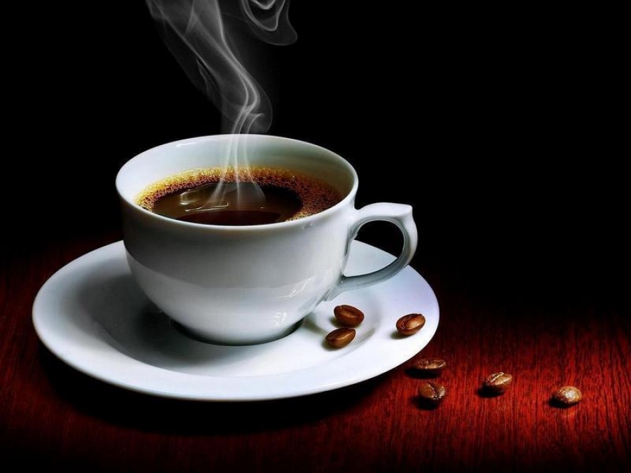 Două substanţe prezente în cafea ar putea încetini dezvoltarea cancerului de prostată