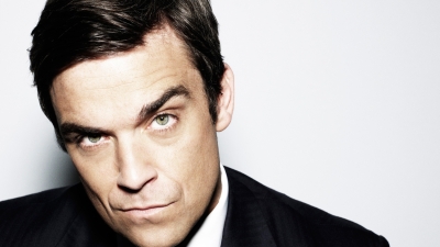Robbie Williams marchează 25 de ani de carieră solo printr-un album de hituri, în variantă orchestrată