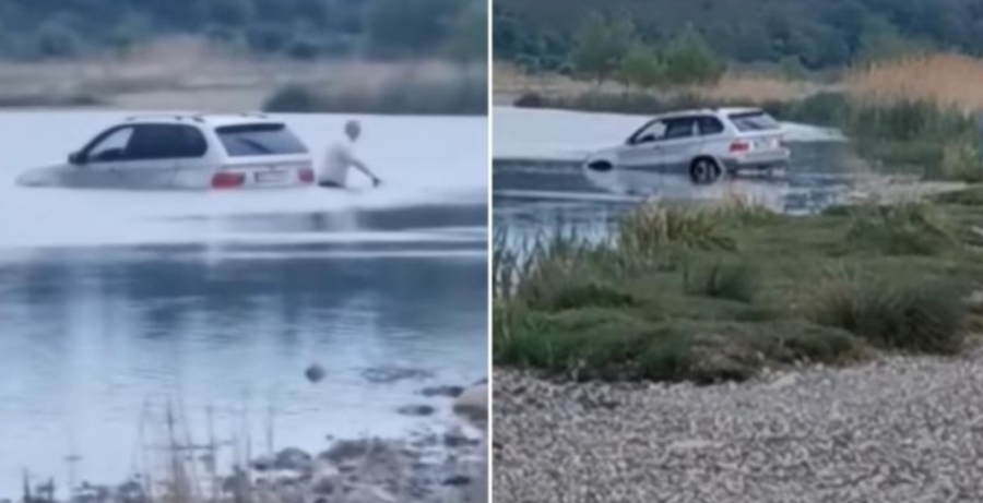Șofer cu BMW, blocat în mijlocul apei (VIDEO)