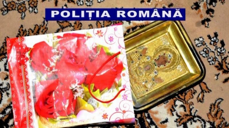 Tablouri furate din Italia, cartuşe, arme şi piei de căprior „fără acte”